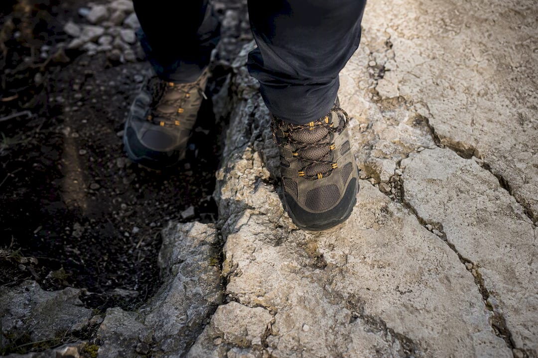 Sturdy shoes on loose limestone trail