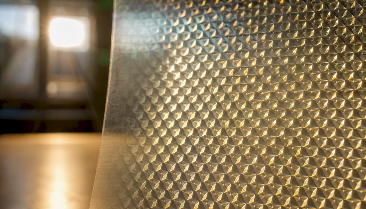 Close-up of prism microstructure on daylight redirecting film