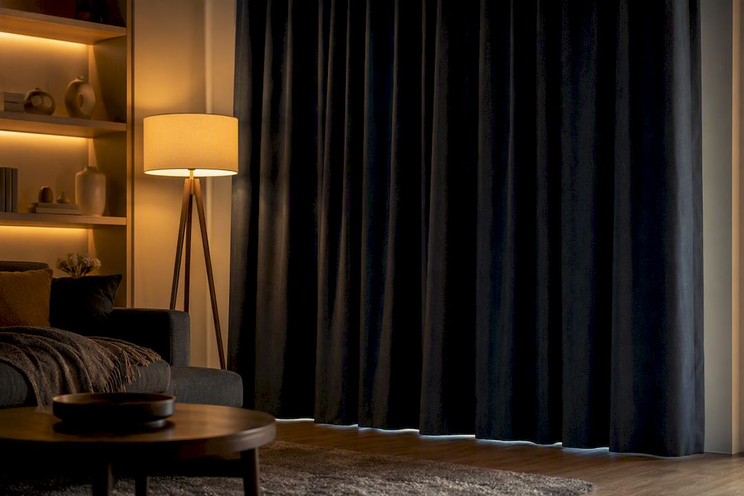 Living room with blackout curtains and soft lighting