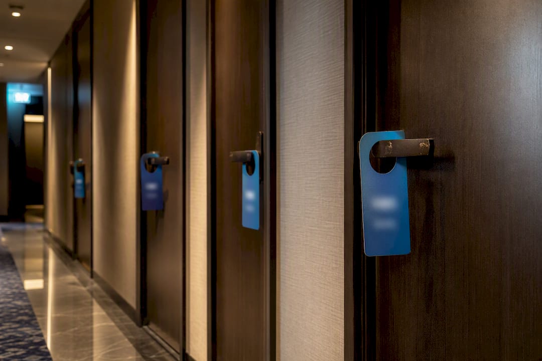 Hotel room doors with varied price tags