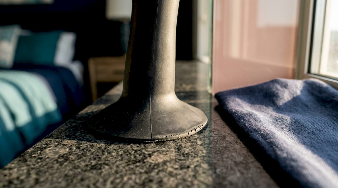 Suction cup dildo base on multiple surfaces