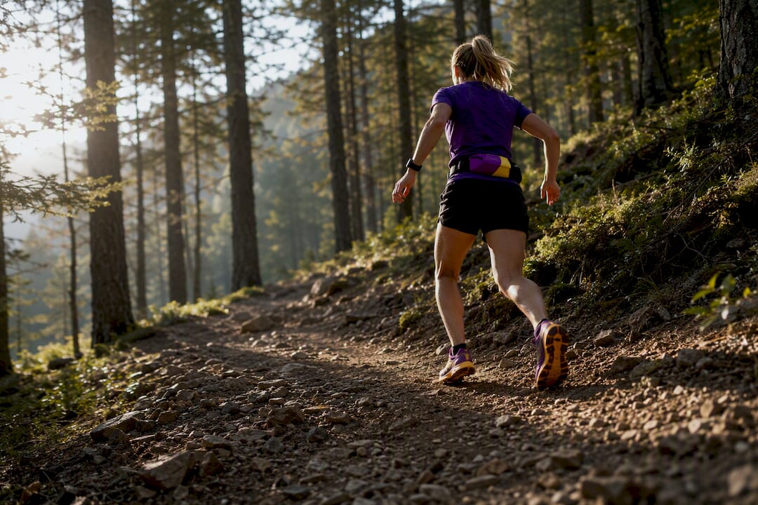 Runner descending trail during eccentric exercise