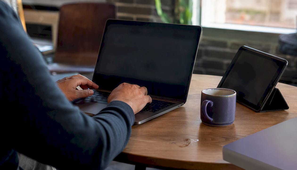 Hands linking digital evidence in health tech office