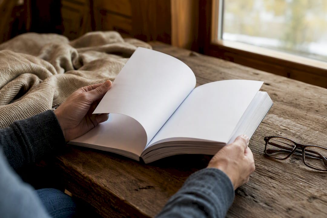 Hand flipping insurance policy pages