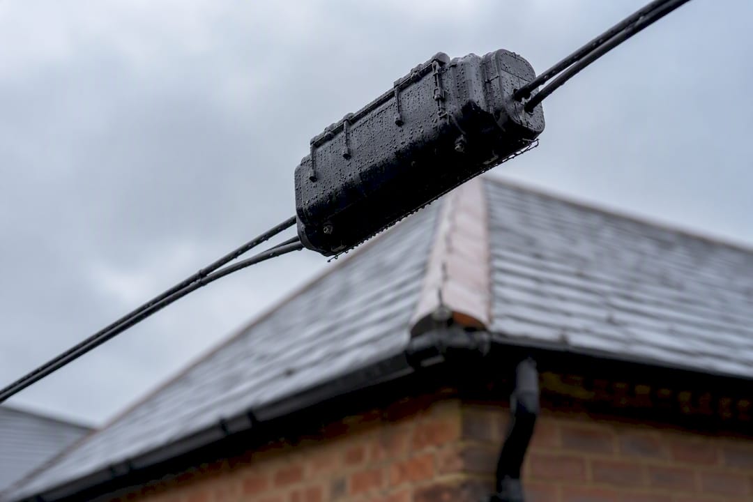 Rain on overhead cable near business premises
