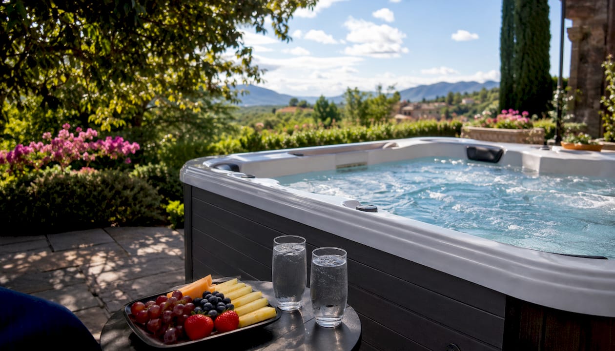 Private outdoor hot tub on woodland deck