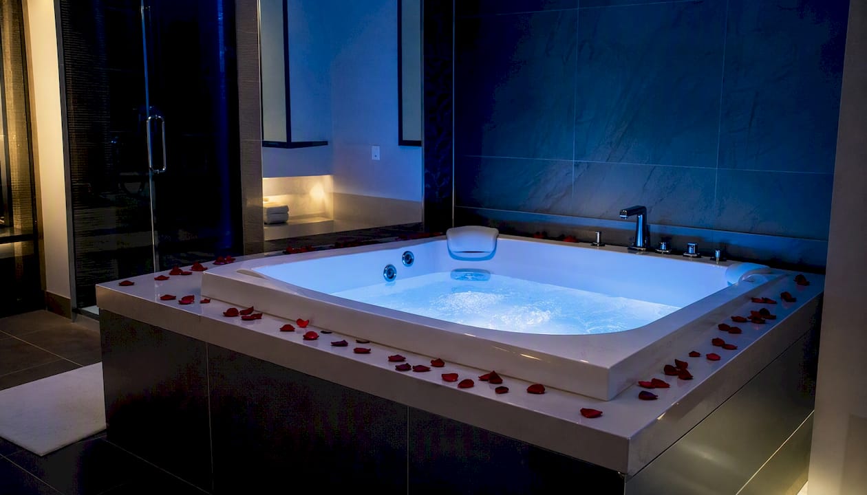 Romantic jacuzzi tub centerpiece with rose petals