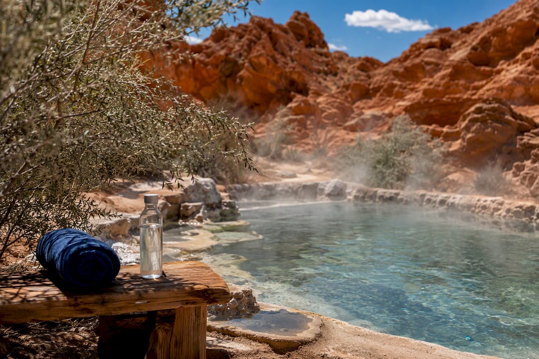 Desert geothermal hot spring steaming in summer