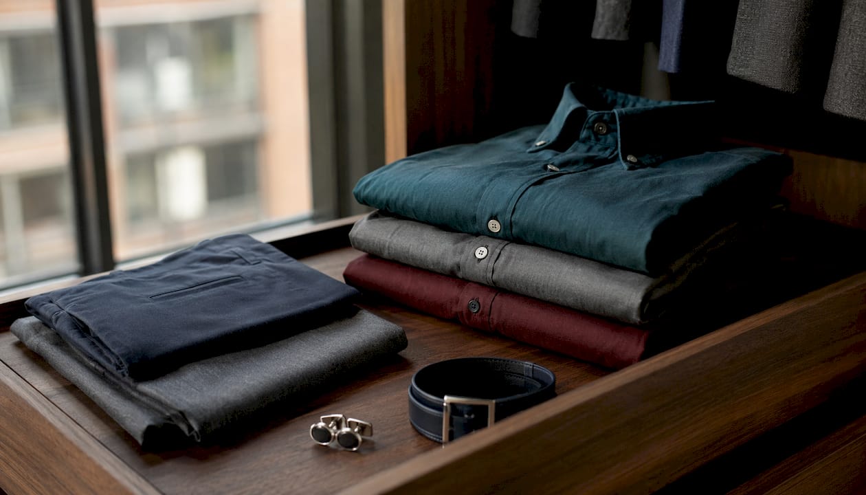 Overhead view of folded business casual wardrobe colors