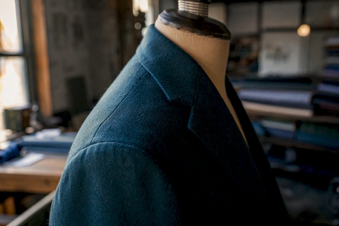 Suit shoulder seam on large frame