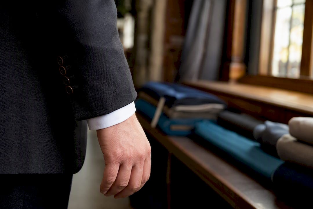 Suit jacket sleeve showing shirt cuff