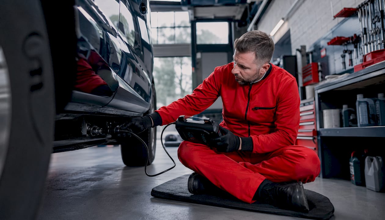 Technician scanning AdBlue system in garage