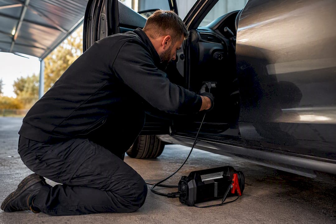 Technician connecting supported ECU remapping equipment
