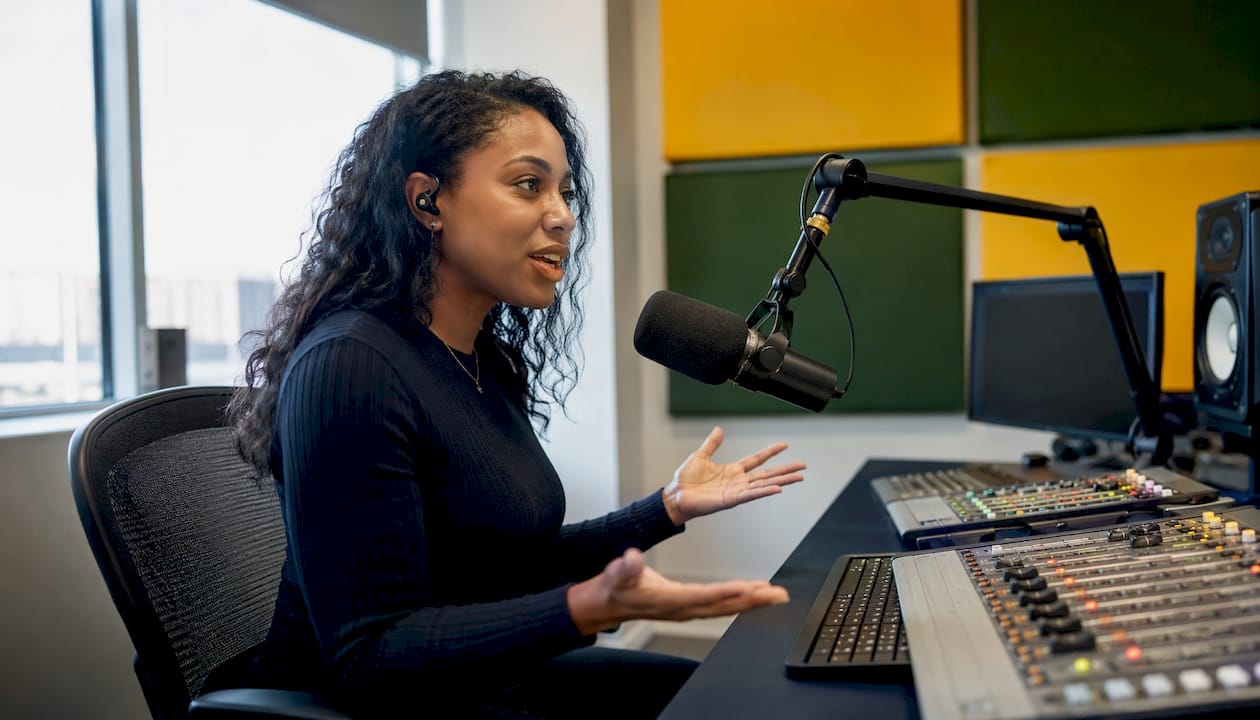 Female podcast host in studio
