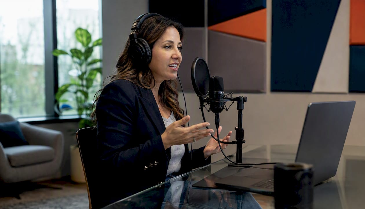 Podcast host recording in professional studio
