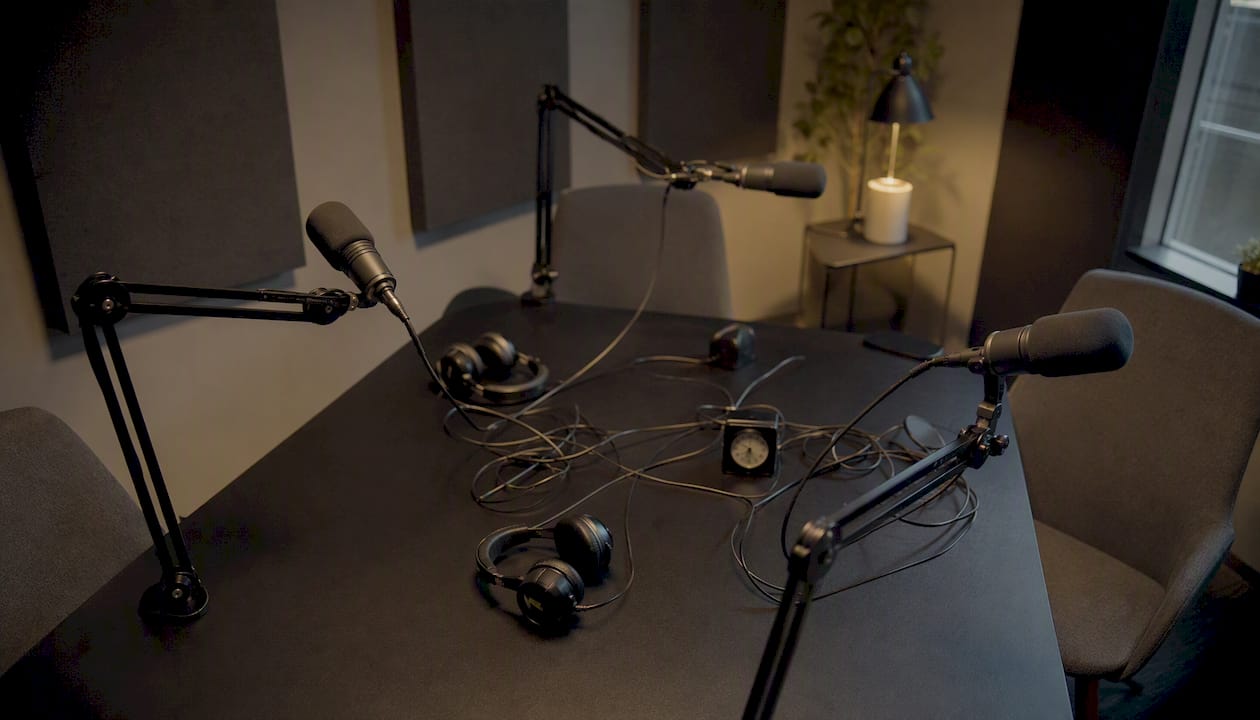 Podcast debate microphones in studio