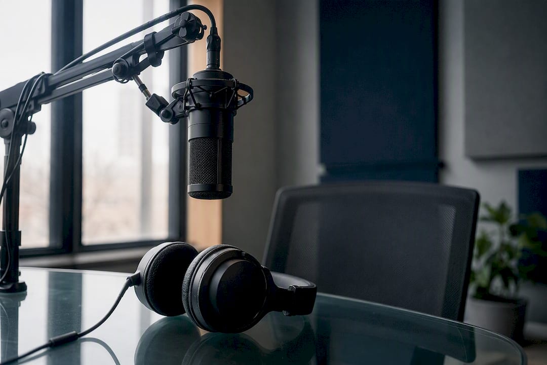 Professional podcast microphone and headphones setup