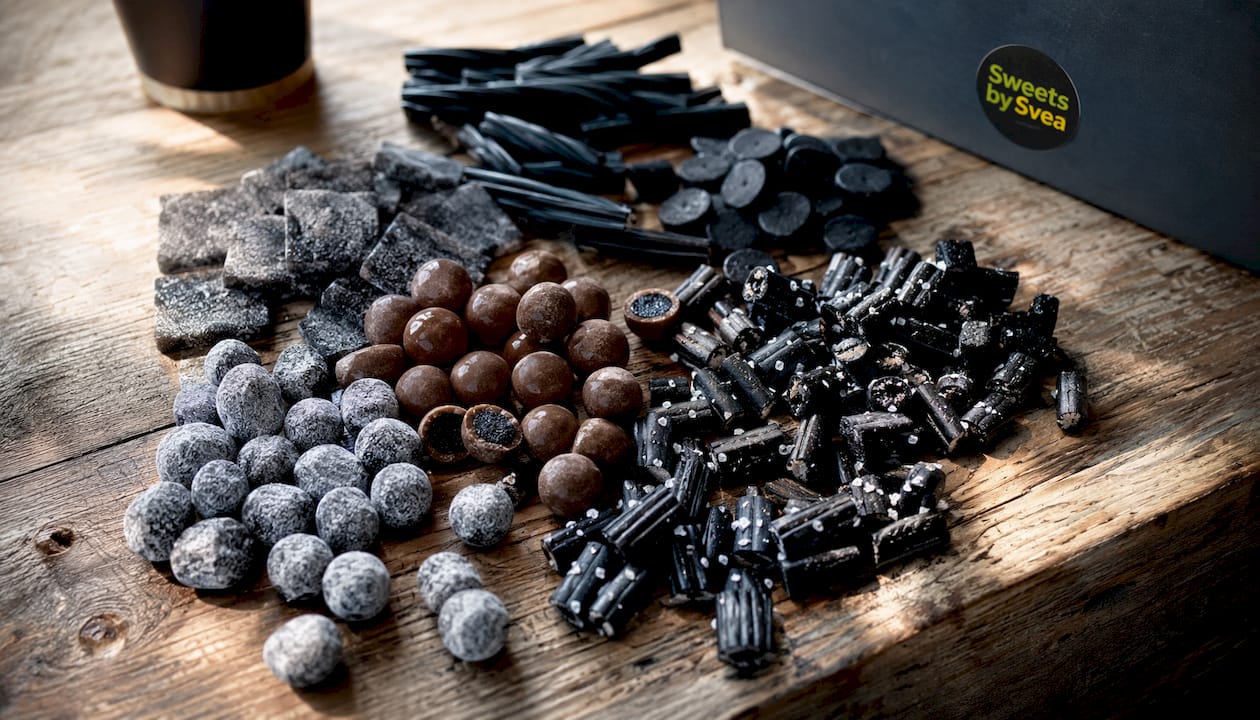 Close-up of assorted salty licorice candies on slate