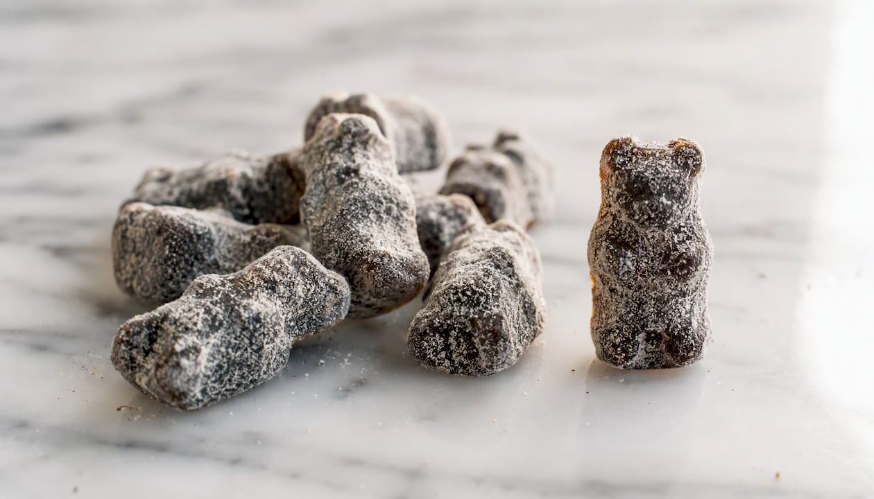 Salty coated gummy bears close-up