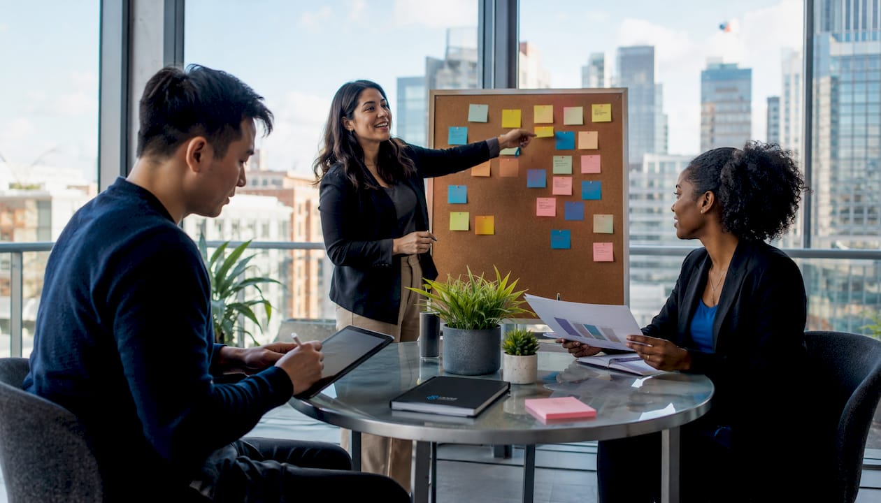 Team collaborating in conference room around table