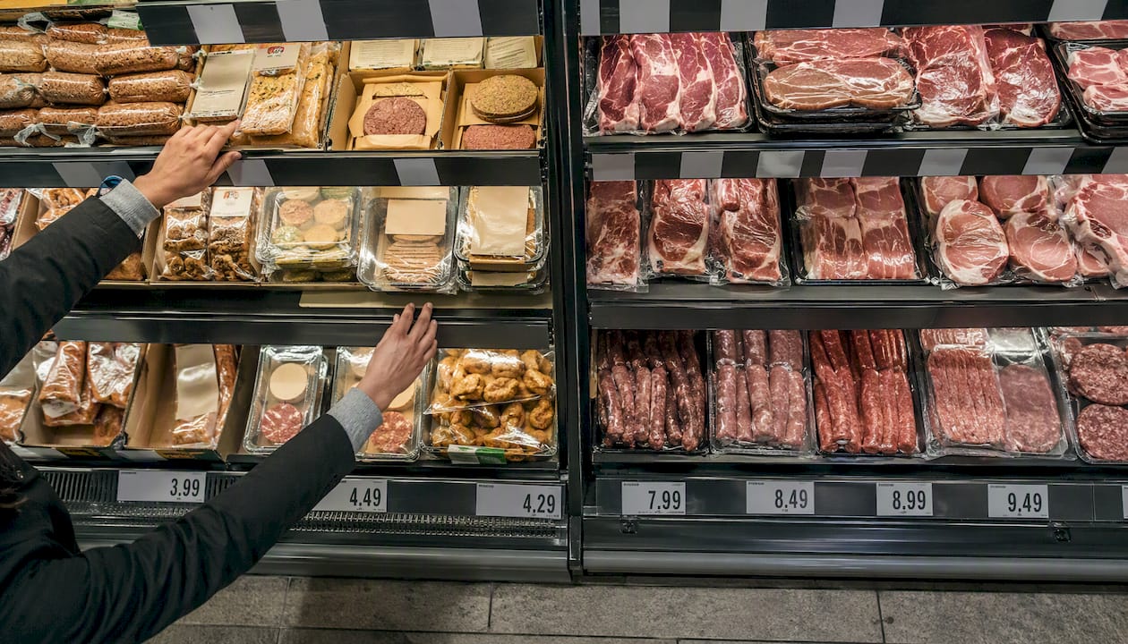 Grocery shelf showing plant-based and animal-based food prices