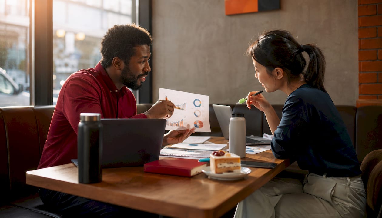 Two professionals discussing 1099 e-file options