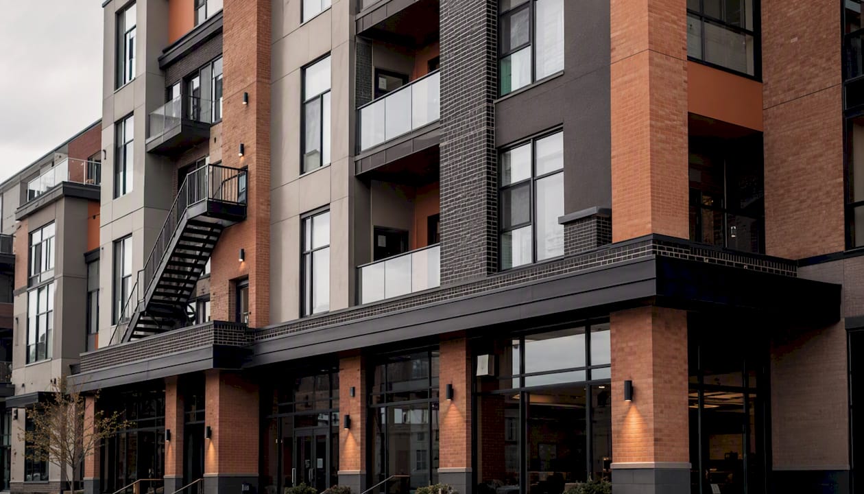 Facade of mixed-use building showing material junctions