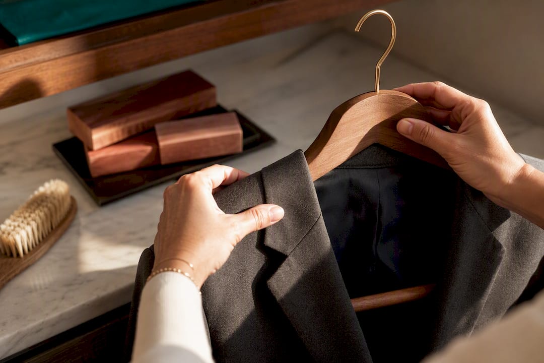 Blazer placed on shaped hanger with cedar