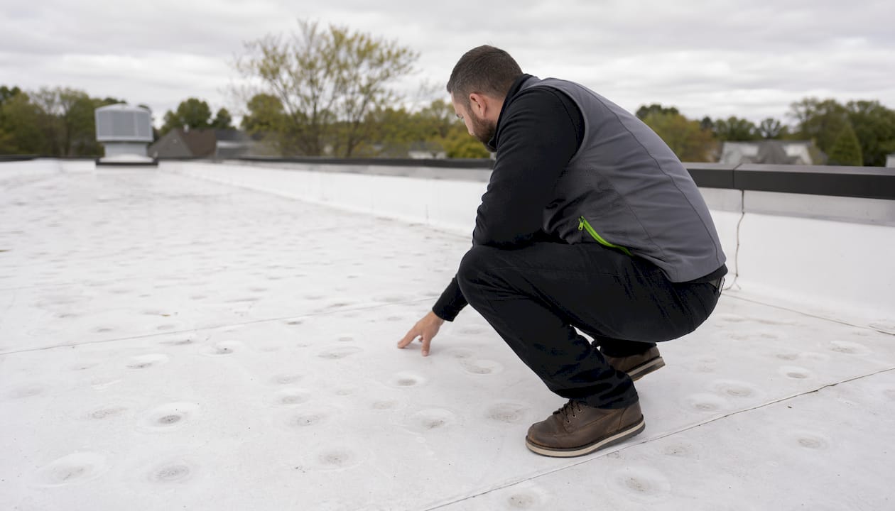 Aerial view of hail damage on TPO commercial roof