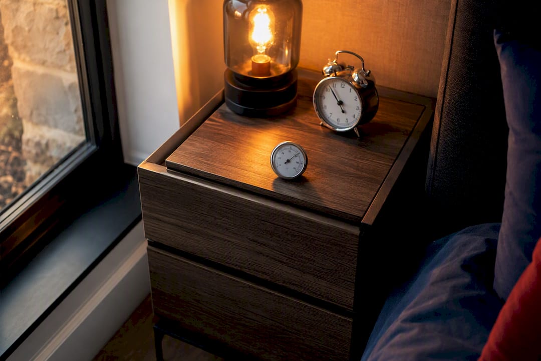 Hygrometer on bedside table in bedroom