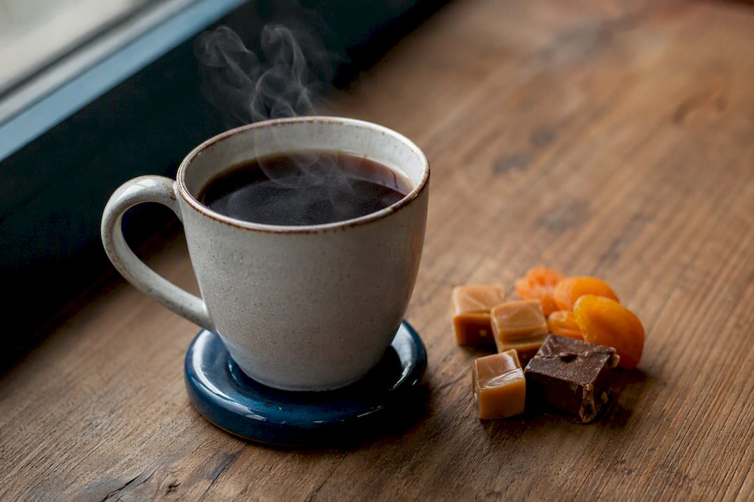 Coffee cup with caramel and fruit tasting notes props