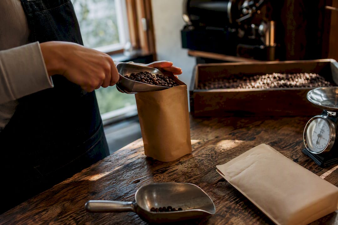 Packing freshly roasted coffee beans