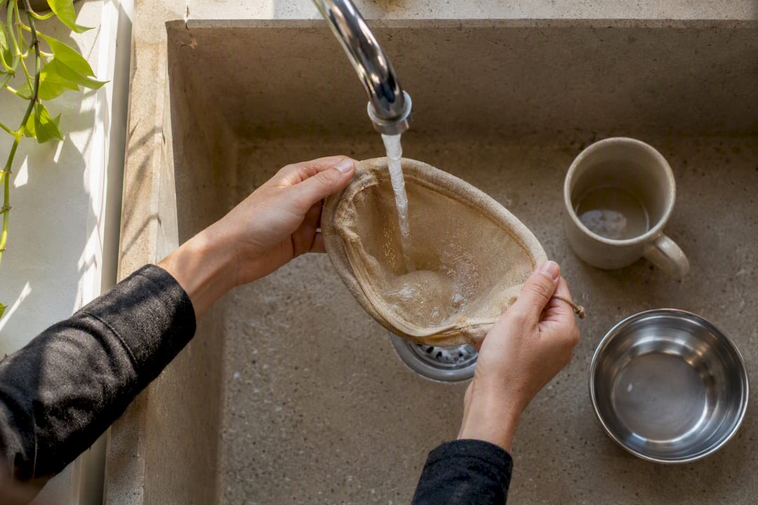 Rinsing a reusable cloth coffee filter