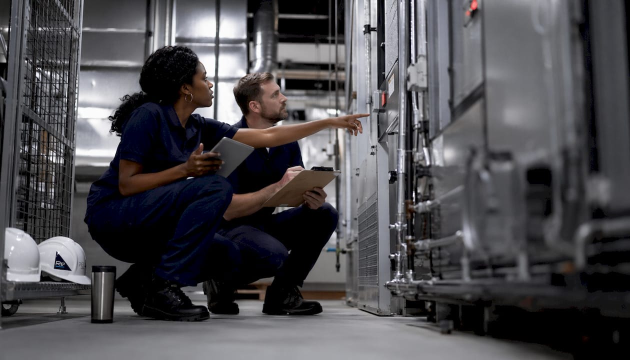 The impact of intelligent building systems in 2026 - Re-solution Maintenance team inspecting HVAC systems