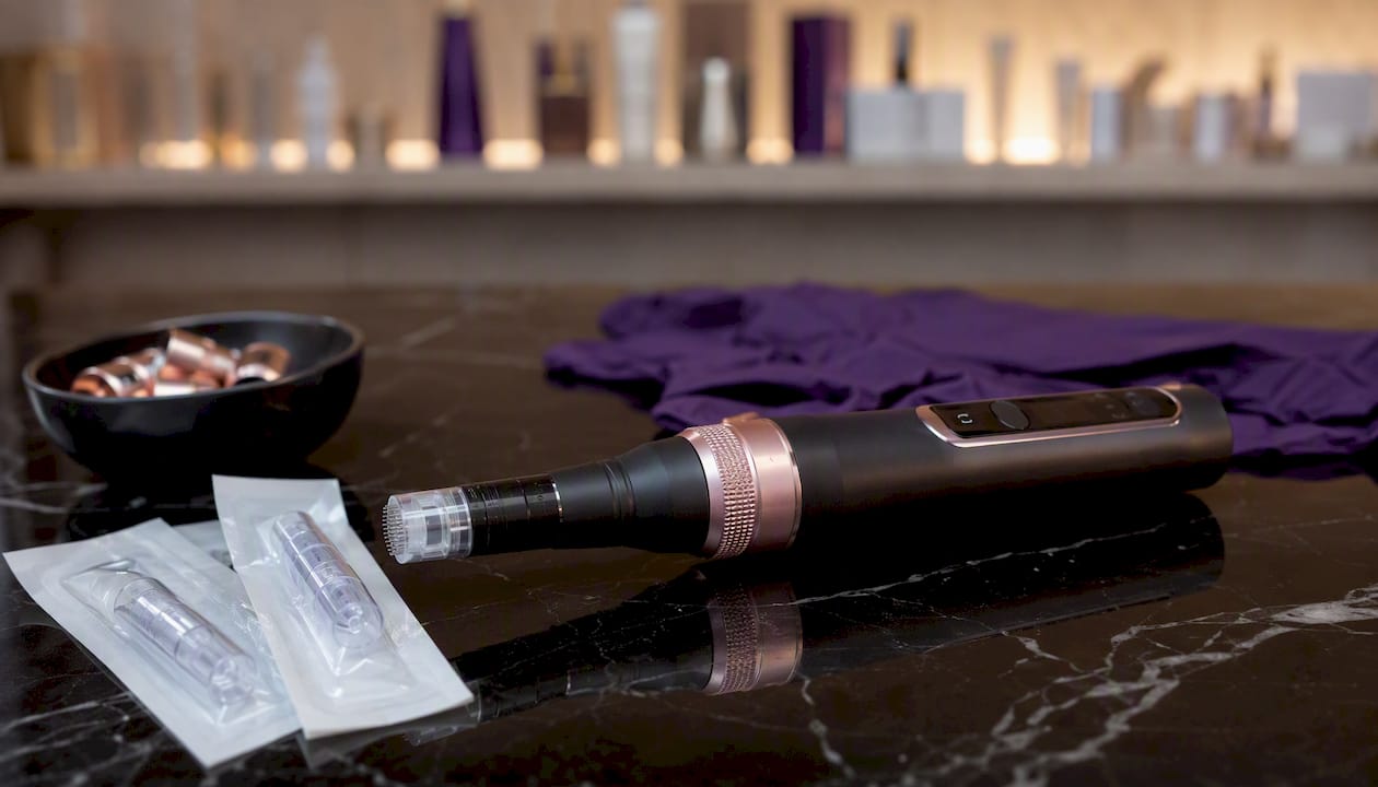 Close-up of microneedling pen and accessories