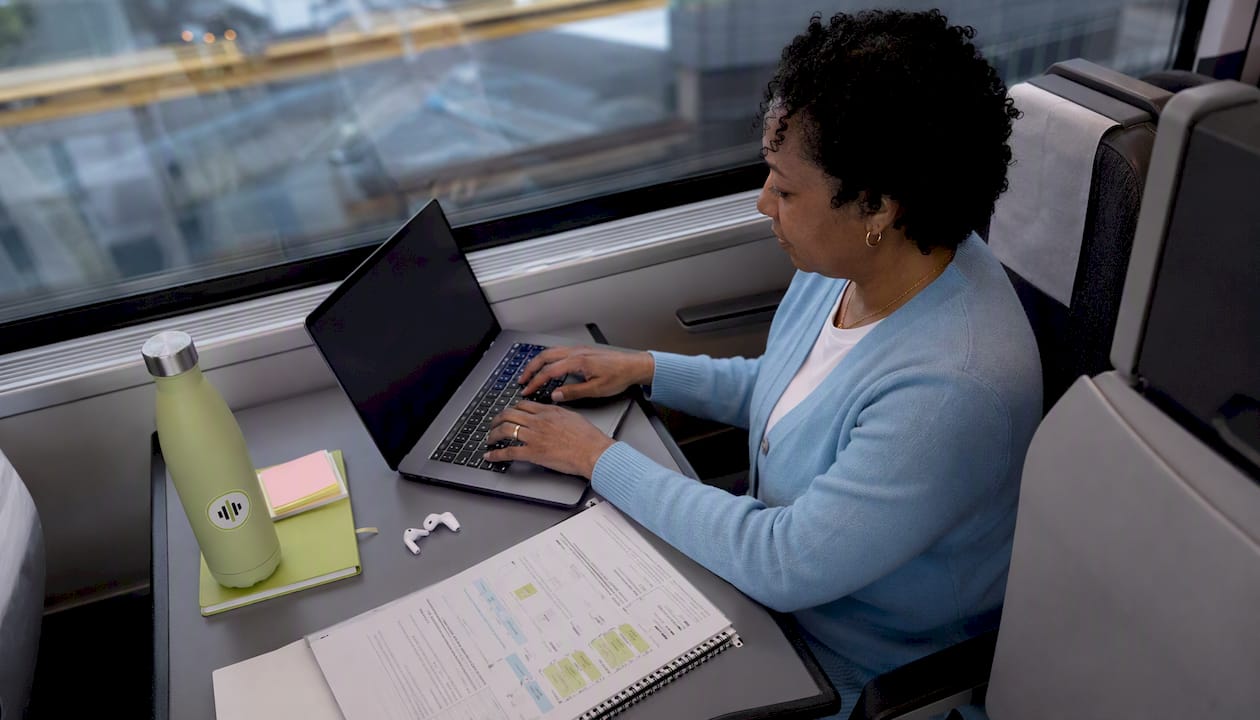Developer typing API code at home office desk