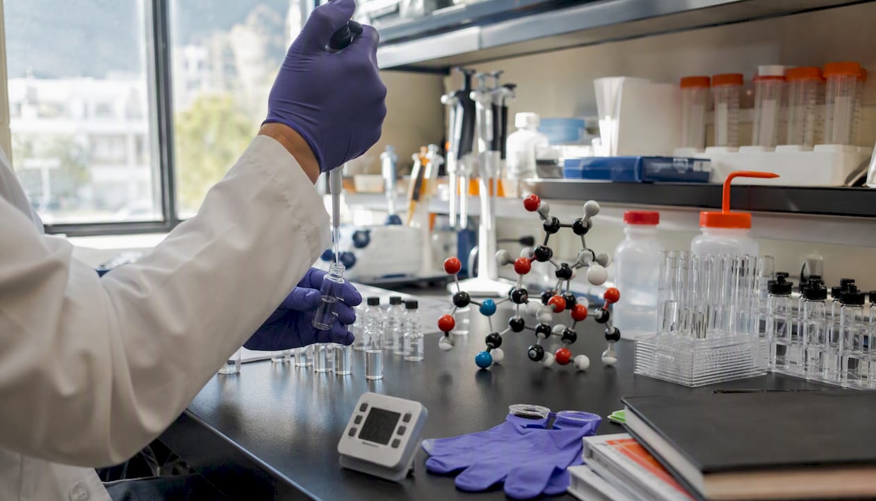 Hands pipetting reagents for clopidogrel metabolism assay