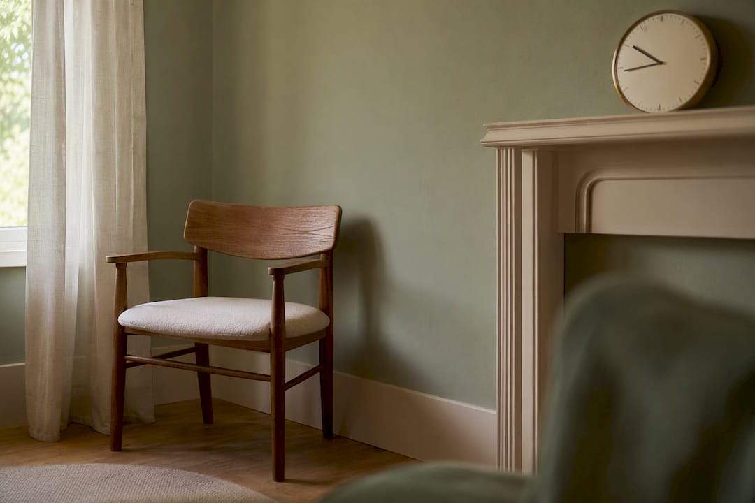 Empty chair and clock symbolizing timed break