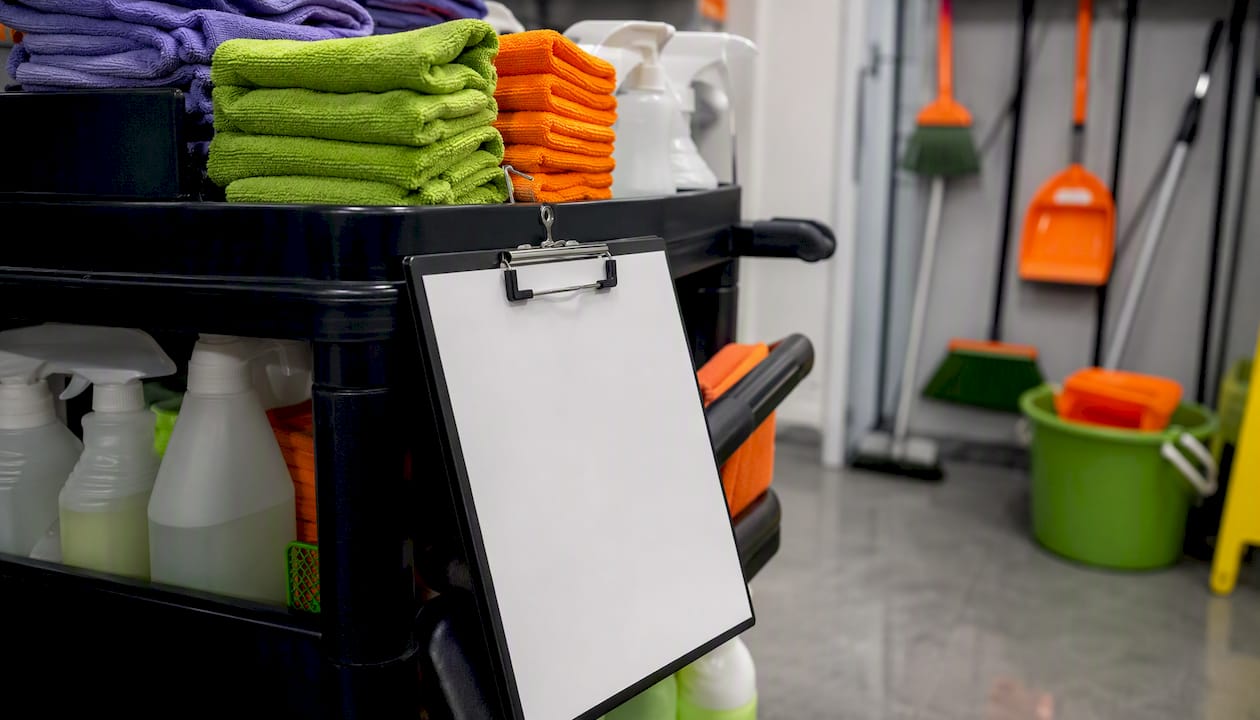 Office cleaning cart with supplies and checklist