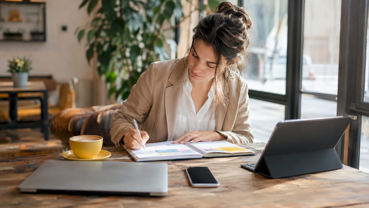 Workspace with productivity tools flat lay