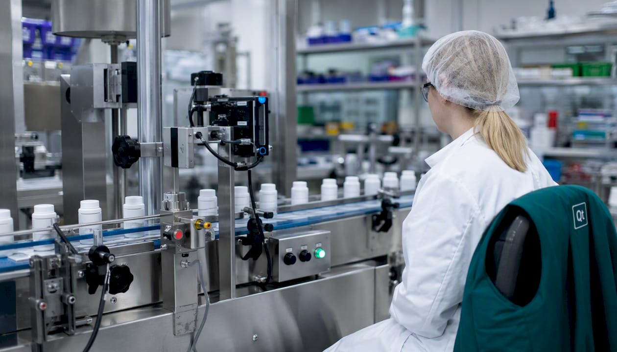 Overhead view of manufacturing quality control machinery