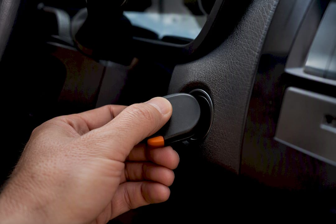 Key fob held against vehicle start button