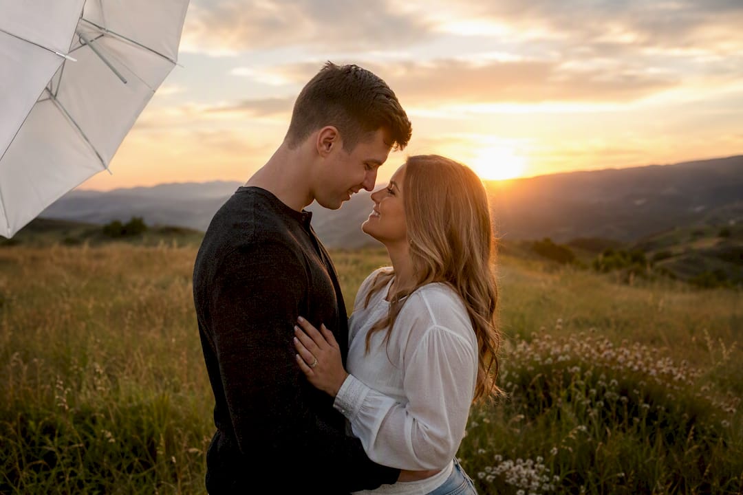 Couple portrait in warm golden hour light outdoors
