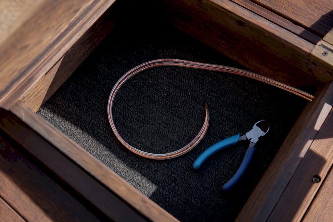 Outdoor speaker cable service loop