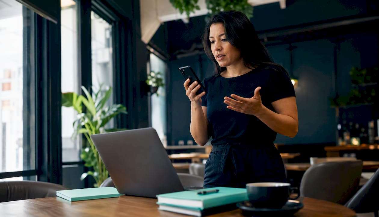 Small business owner setting up missed call text system
