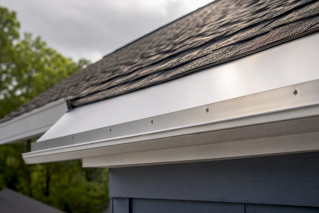 Angled metal flashing on house eaves
