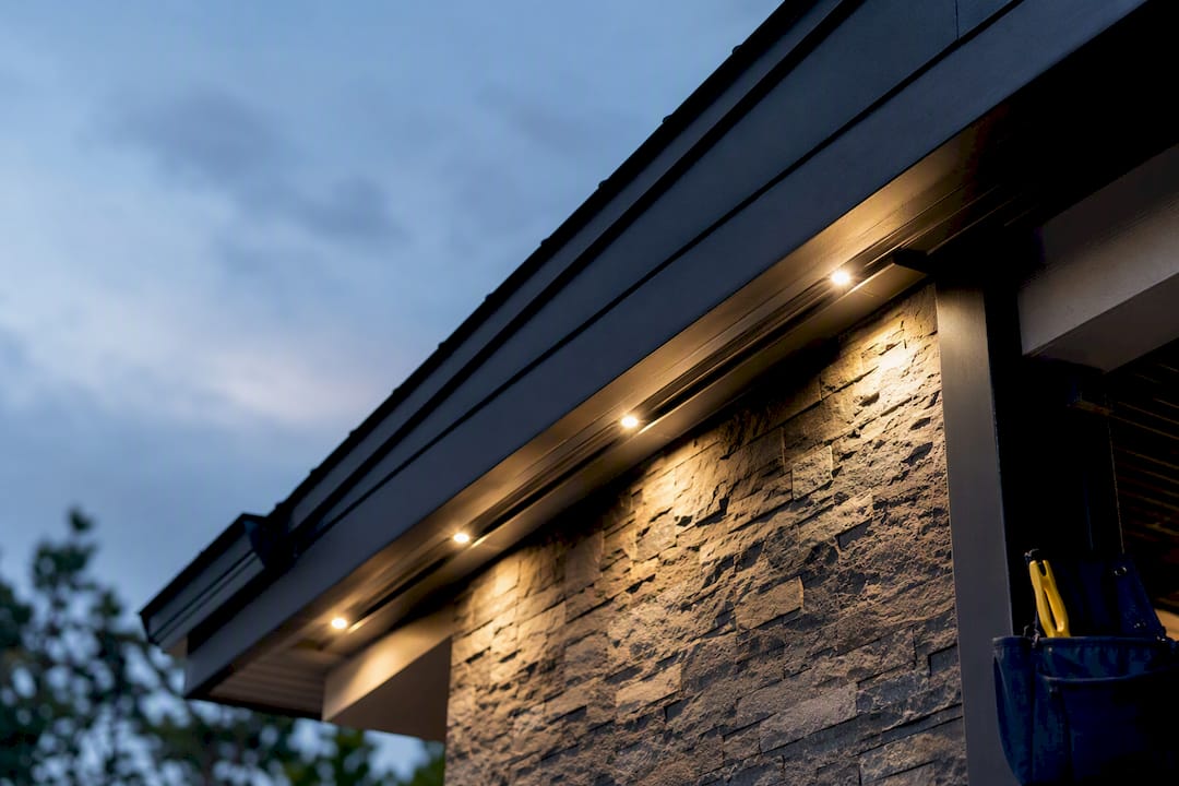 Nearly concealed roofline lighting installation