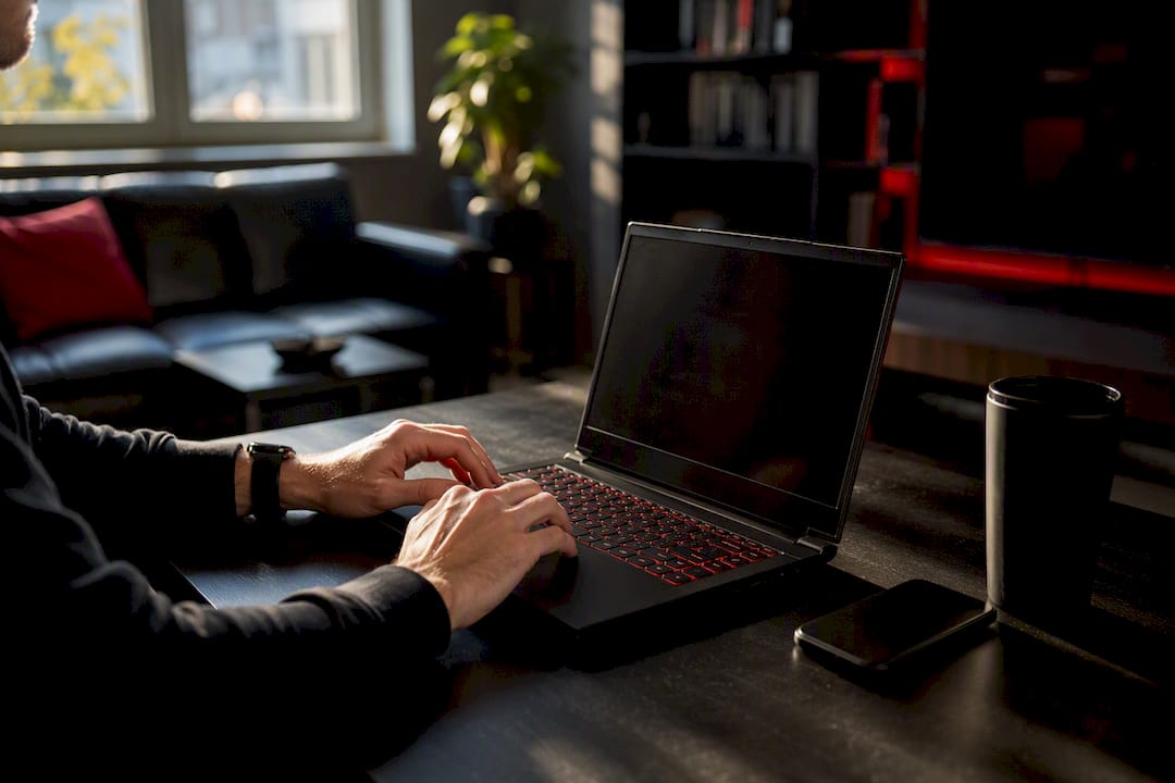 Hands interacting with laptop and extension icon