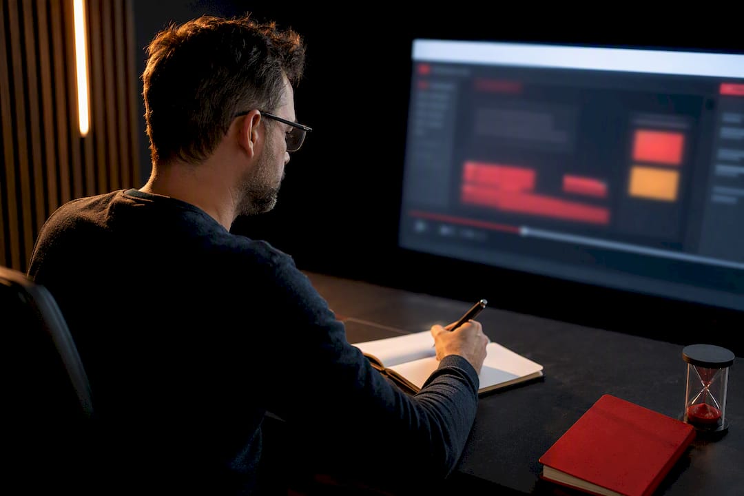 Specialist reviewing a recorded product demo