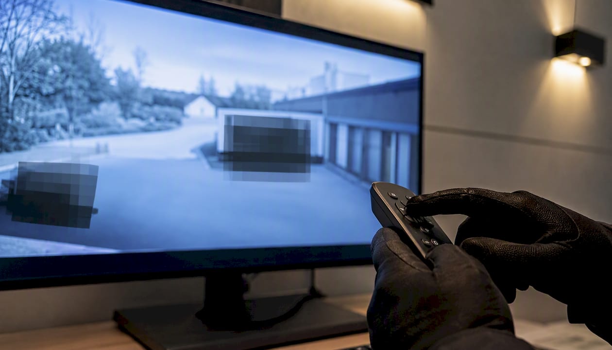 Technician adjusting CCTV privacy mask on footage